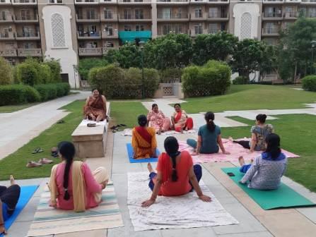 International Yoga Day: People do yoga in Sector 1 DLF 2 Apartments of Gurugram